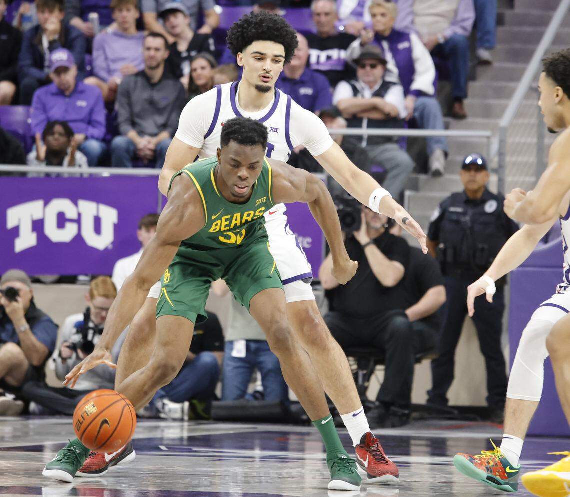 Baylor center James Nnaji (50) backs into TCU forward David Punch (15) during the first half of a NCAA basketball game between Baylor University and TCU at Schollmaier Arena in Fort Worth, Texas, Saturday Jan. 03, 2026
