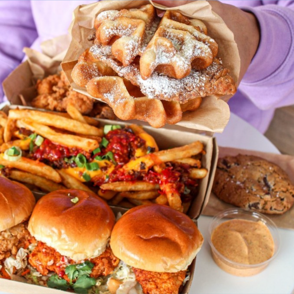 Chicken and waffles, loaded fries, and the chicken trio sliders from Daddy’s Chicken Shack.