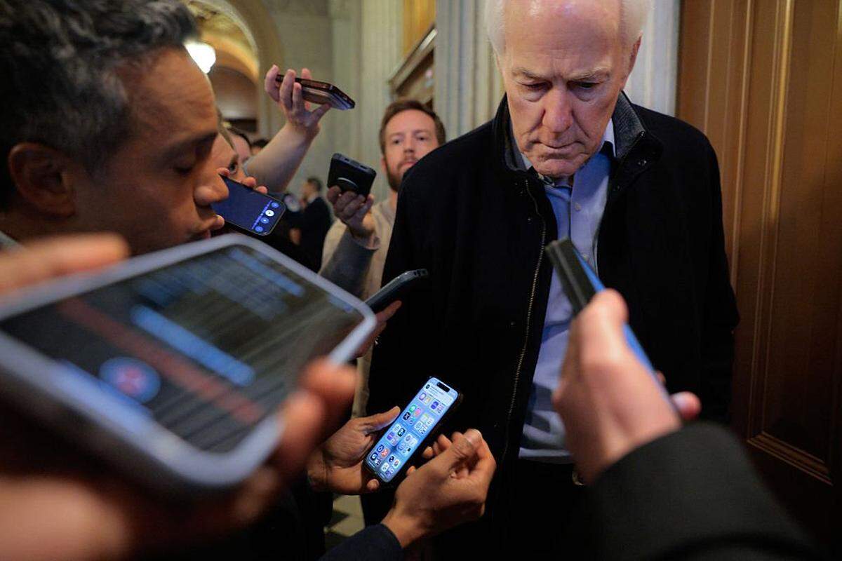 WASHINGTON, DC - MARCH 04: Sen. John Cornyn (R-TX) declines to answer reporters’ questions as he leaves the Senate Chamber following a vote at the U.S. Capitol on March 04, 2026 in Washington, DC. Cornyn returned from Texas to vote against a Democratic-backed war powers resolution that would prevent President Donald Trump from continuing the military campaign against Iran. (Photo by Chip Somodevilla/Getty Images)
