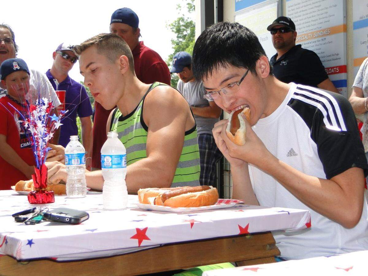 Competitors in the 2017 Curly's hot dog eating contest.