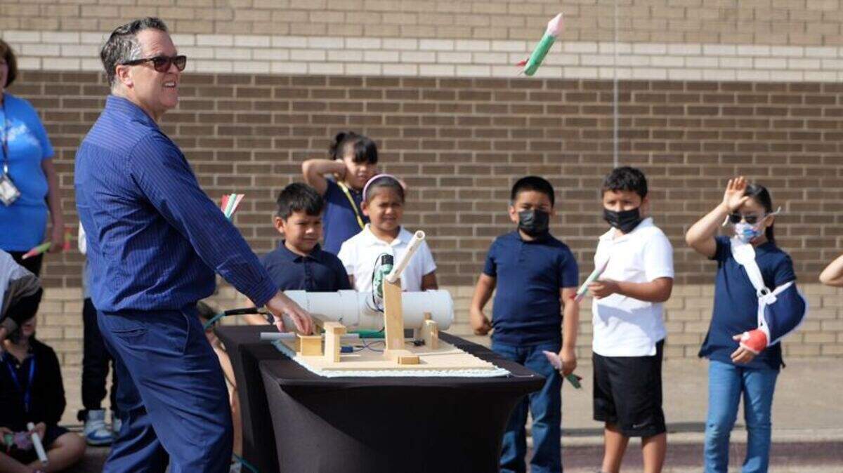 Third-graders watch a rocket launch during a demonstration at Alice Contreras Elementary School. The project allows students to explore STEM innovation and participate in hands-on activities.