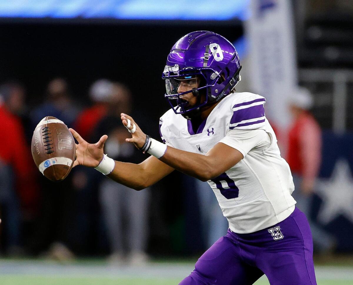 Anna quarterback Ziondre Williams takes the snap in the third quarter of the UIL Conference 4A Division 1 state championship football game at AT&T Stadium in Arlington, Texas, Thursday, Dec. 14, 2023.