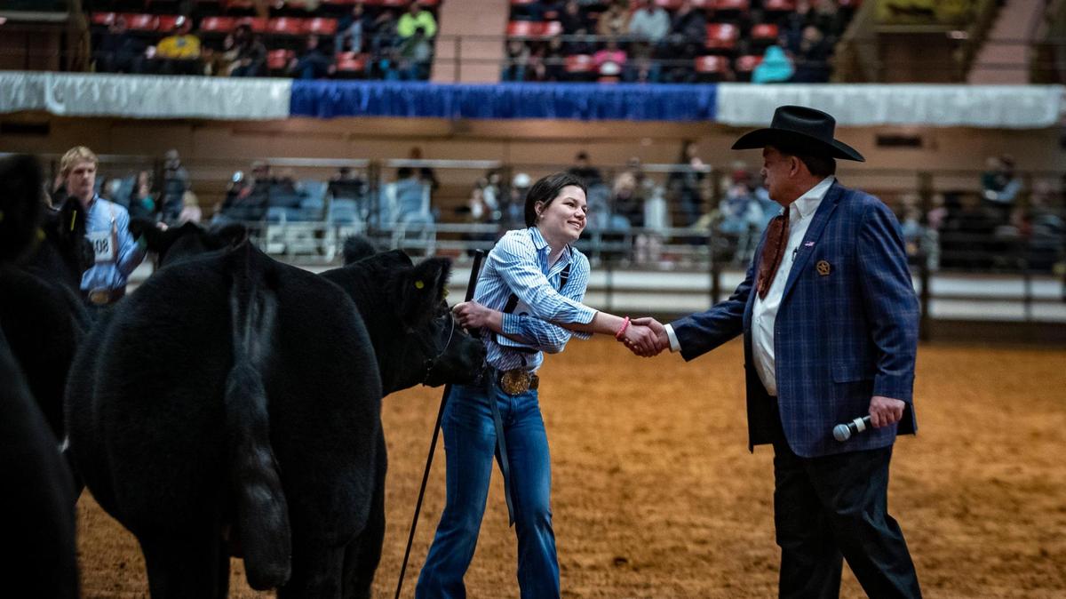 Sadie Wampler, 15, shakes hands with judge Jarold Callahan after her steer was recognized as Grand Champion during the Fort Worth Stock Show and Rodeo’s Jr. Steer Show on Friday, Feb. 3, 2023.