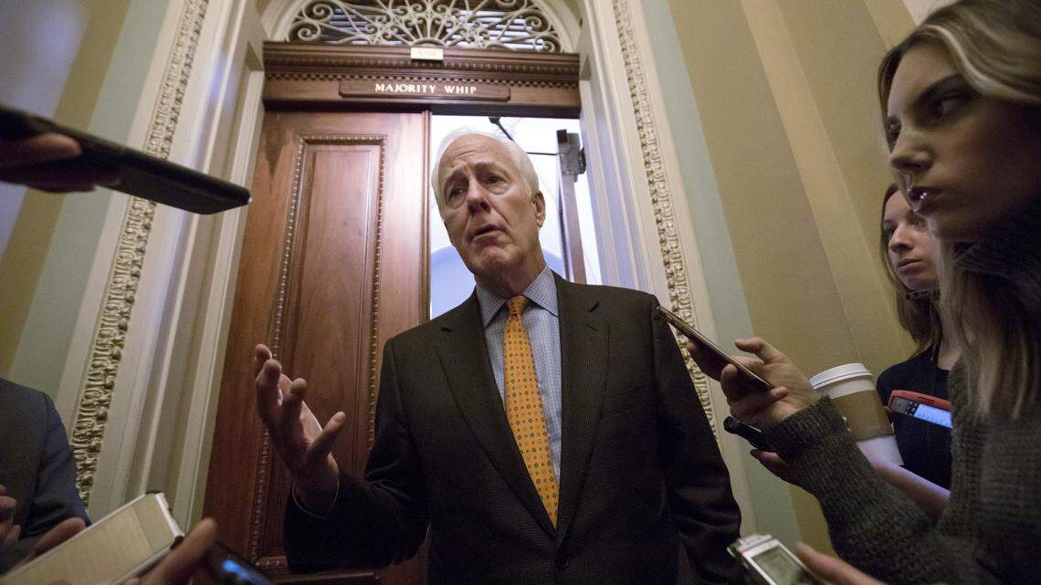 Senate Majority Whip John Cornyn, R-Texas, speaks with reporters outside his office on Capitol Hill in Washington D.C., Friday, Jan. 19.