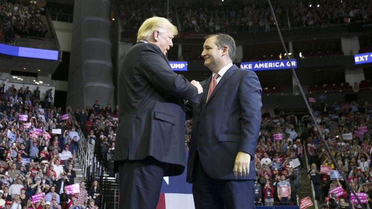 President Donald J. Trump greets U.S. Sen. Ted Cruz during a rally at the Toyota Center in Houston on Oct. 22, 2018.