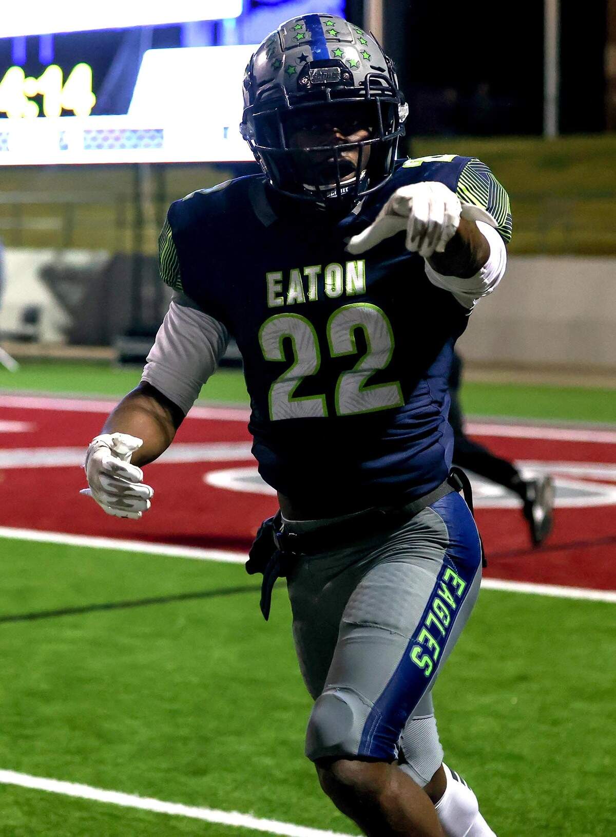 Eaton running back JB Brown runs back to the sidelines after scoring a touchdown against Fort Worth Boswell during the first half of the 6A Bi-District Region I Division II High School Football playoff game played at Northwest ISD Stadium on Thursday, November 11, 2021, in Justin. (Steve Nurenberg/Special to the Star-Telegram)