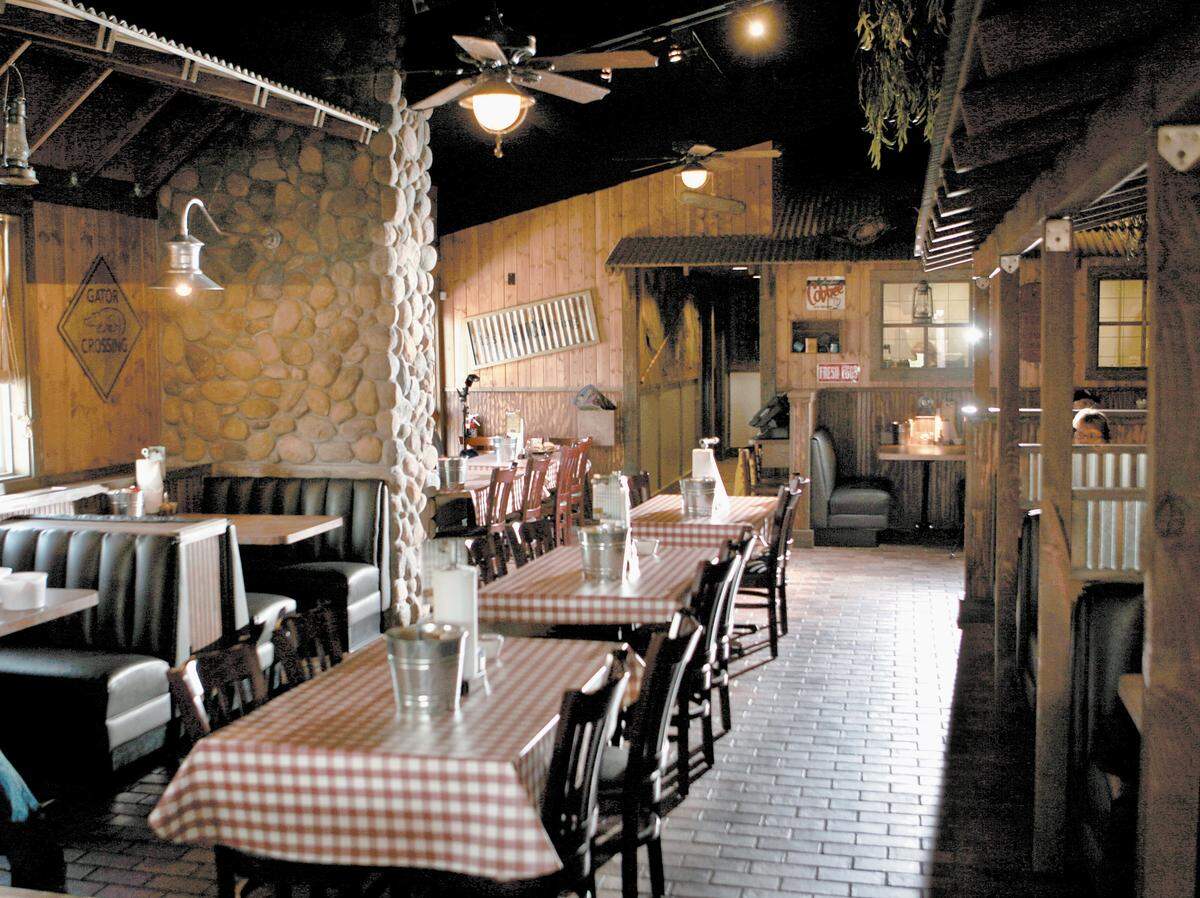 Huckleberry’s restaurants started in California but offer a vaguely Cajun menu and fishing-camp look.