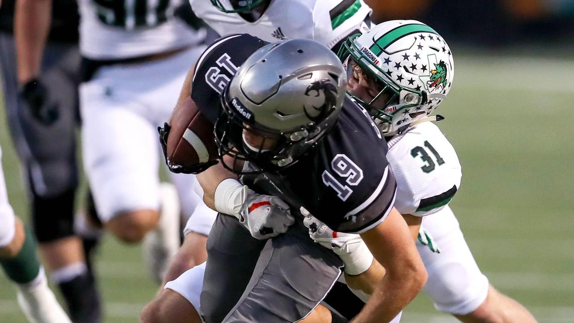 Denton Guyer wide receiver Seth Meador (19) comes up with a reception and is brought down by Southlake Carroll defensive back Jonah Doddridge (31) during the first half, Friday night, October 4, 2019 played at C.H. Collins Complex Stadium in Denton, TX.