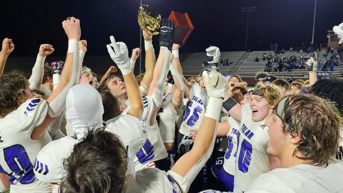 The Tolar football team hoists the Class 2A Division 1 state semifinal trophy after downing Stratford on Thursday, December 7, 2023 at Lion Stadium in Vernon, Texas. Tolar will play for its first state title next week.