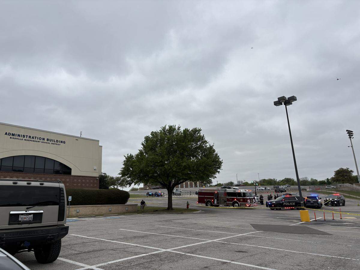 Haltom City, Texas police are investigating a suspected double murder and suicide in the parking lot of Birdville Independent School District property in the 6200 block of Broadway Avenue on Friday afternoon.
