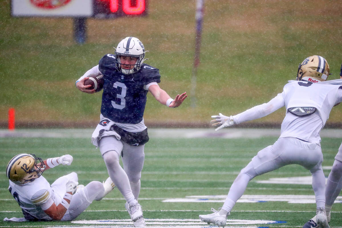 Fort Worth All Saints quarterback Gavin Parkhurst runs through the defense at Waco ISD Stadium in Waco, Texas, on Saturday, Dec. 7, 2024.