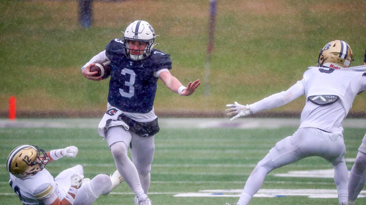 Fort Worth All Saints quarterback Gavin Parkhurst runs through the defense at Waco ISD Stadium in Waco, Texas, on Saturday, Dec. 7, 2024.
