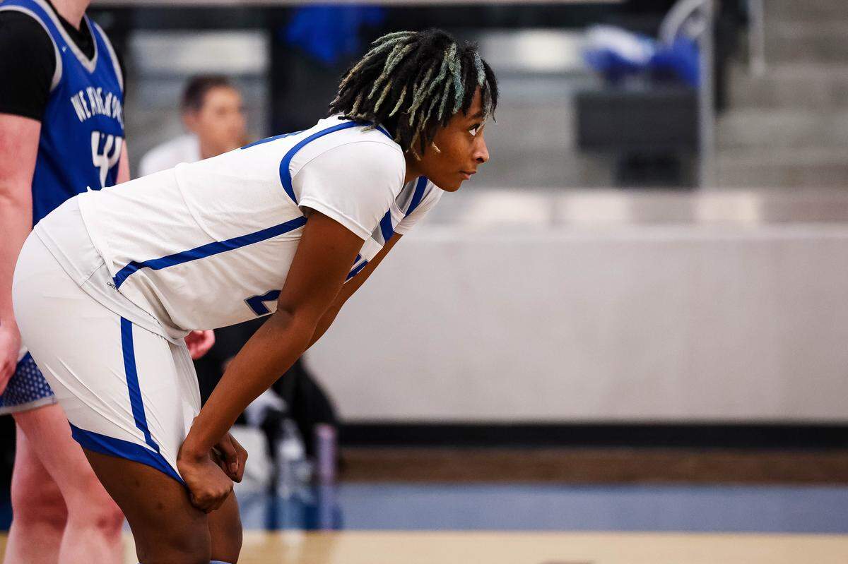 North Crowley forward Mecca Crawford puts her hands on her knees during a free throw in a District 3-6A matchup against Weatherford on Friday at North Crowley.