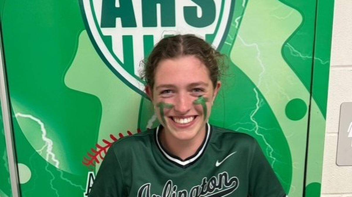 Arlington High catcher Abby Moore has made a successful transition to softball after playing baseball since she was 4 years old.