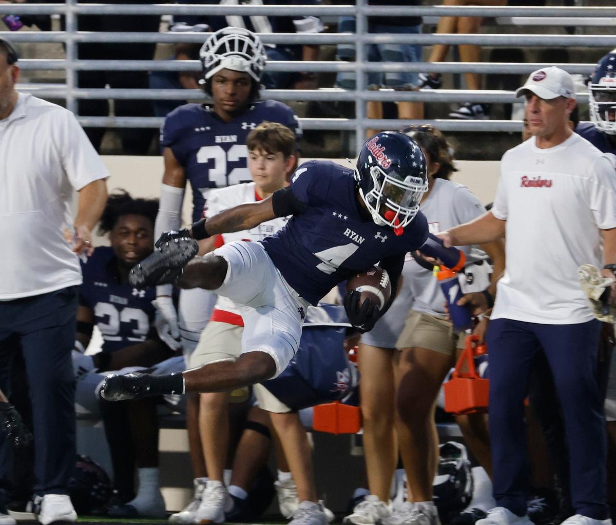 Denton Ryan running back Tre’Vaughn Reynolds (4) flies out of bounds after a catch during a UIL football game at C.H. Collins Activity Complex in Denton, Texas, Thursday, Sept. 05, 2024.