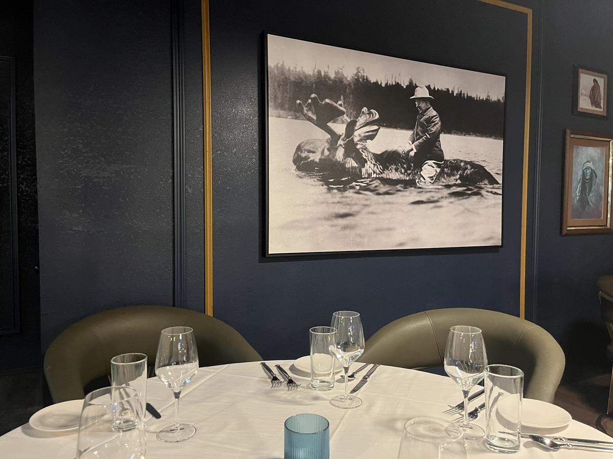 President Theodore Roosevelt riding a bull moose, which was the nickname for the political party he led at the time, at Theodore’s Steak and Seafood in Arlington.