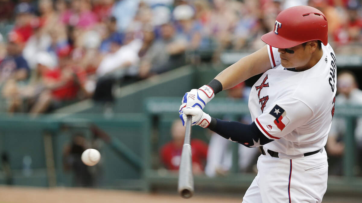 Texas Rangers' Shin-Soo Choo hits a solo home run during the third inning of the team's baseball game against the Houston Astros, Wednesday, July 4, 2018, in Arlington, Texas.