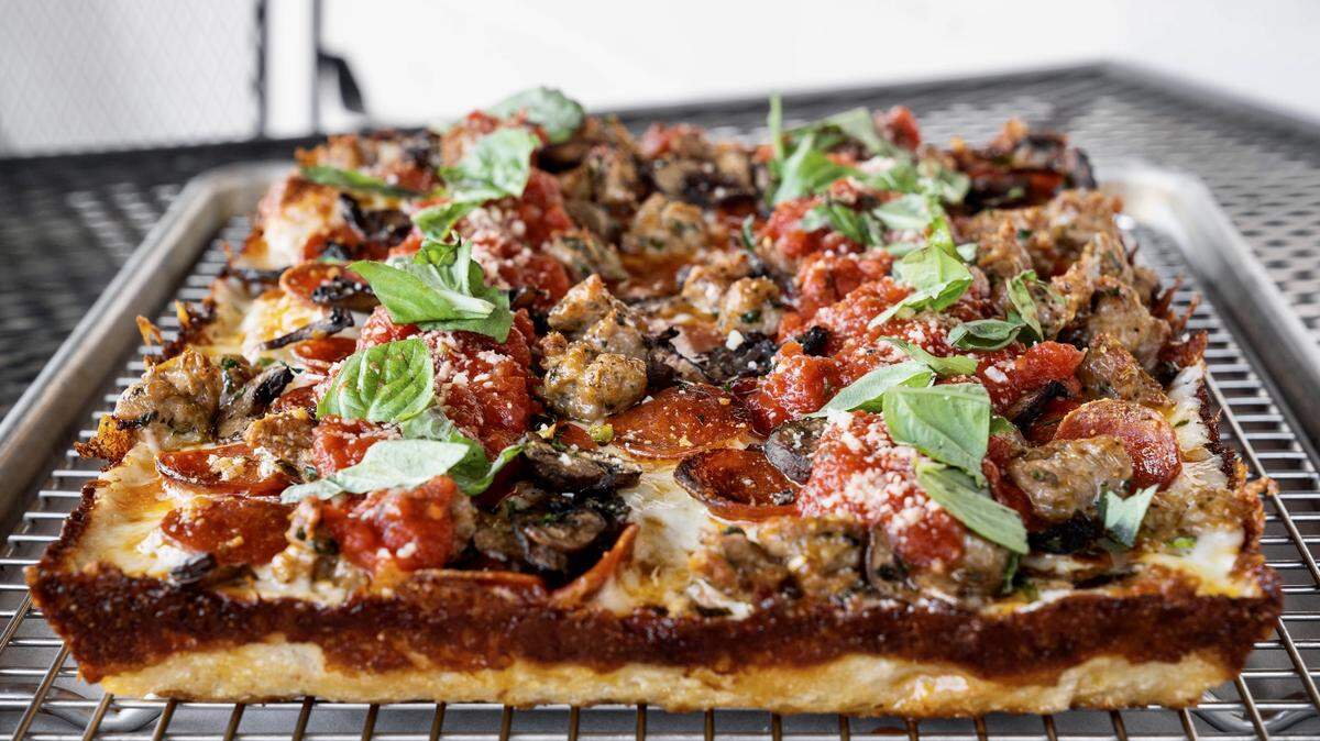 The “Thunder Mifflin” pizza has pepperoni, sausage and mushrooms.