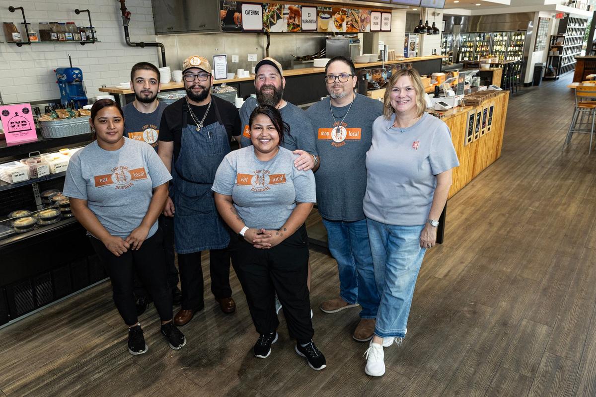The staff of Neighbors House restaurant including Evelin Rodriguez, left, Gabriel Orduna, back left, Raul Orduna, third from left, Carolina Gomez, front, Kevin Smith, rear, and owners Kyle and Ashlee Cowan, right, are photographed in their restaurant in downtown Fort Worth on Thursday, Aug. 22, 2024.