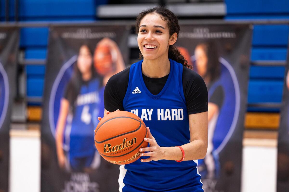 Boswell senior Camille Williams shares a laugh with her teammates during a scrimmage in practice at the Boswell High School gymnasium in Fort Worth on Wednesday, Jan. 29, 2025.