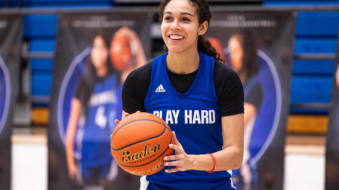 Boswell senior Camille Williams shares a laugh with her teammates during a scrimmage in practice at the Boswell High School gymnasium in Fort Worth on Wednesday, Jan. 29, 2025.