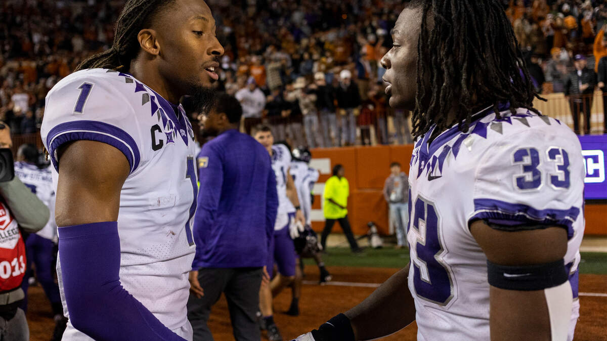 TCU wide receiver Quentin Johnston (1) and running back Kendre Miller (33) are the latest Horned Frogs to announce that they will enter the NFL draft.