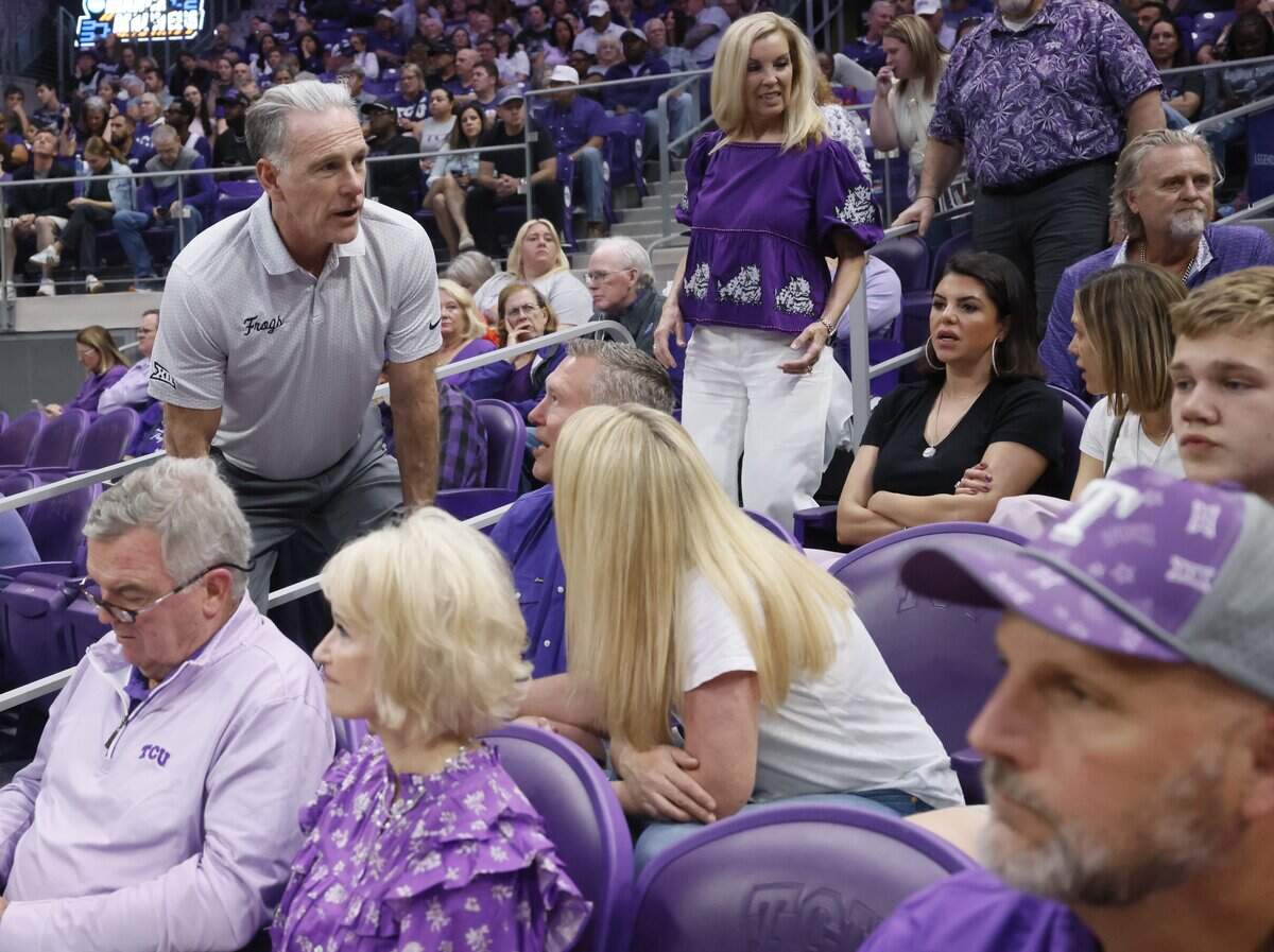 TCU head basketball coach Jamie Dixon talks with fans before the second half of a second round NCAA Division I Women's Basketball Championship game at Schollmeier Arena in Fort Worth, Texas, Sunday, March, 22, 2026.