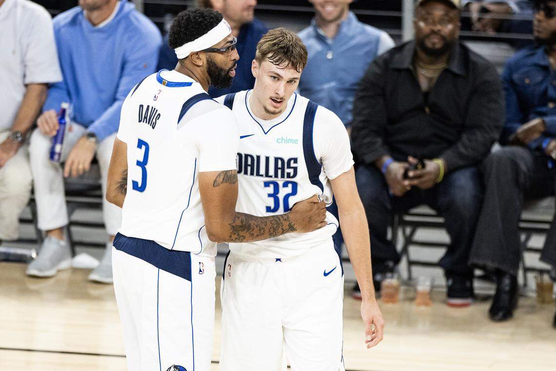 Mavericks forward Anthony Davis (3) has a word with forward Cooper Flagg (32) in the first half of a preseason NBA game between the Dallas Mavericks and Oklahoma City Thunder at Dickies Arena in Fort Worth on Monday, Oct. 6, 2025.