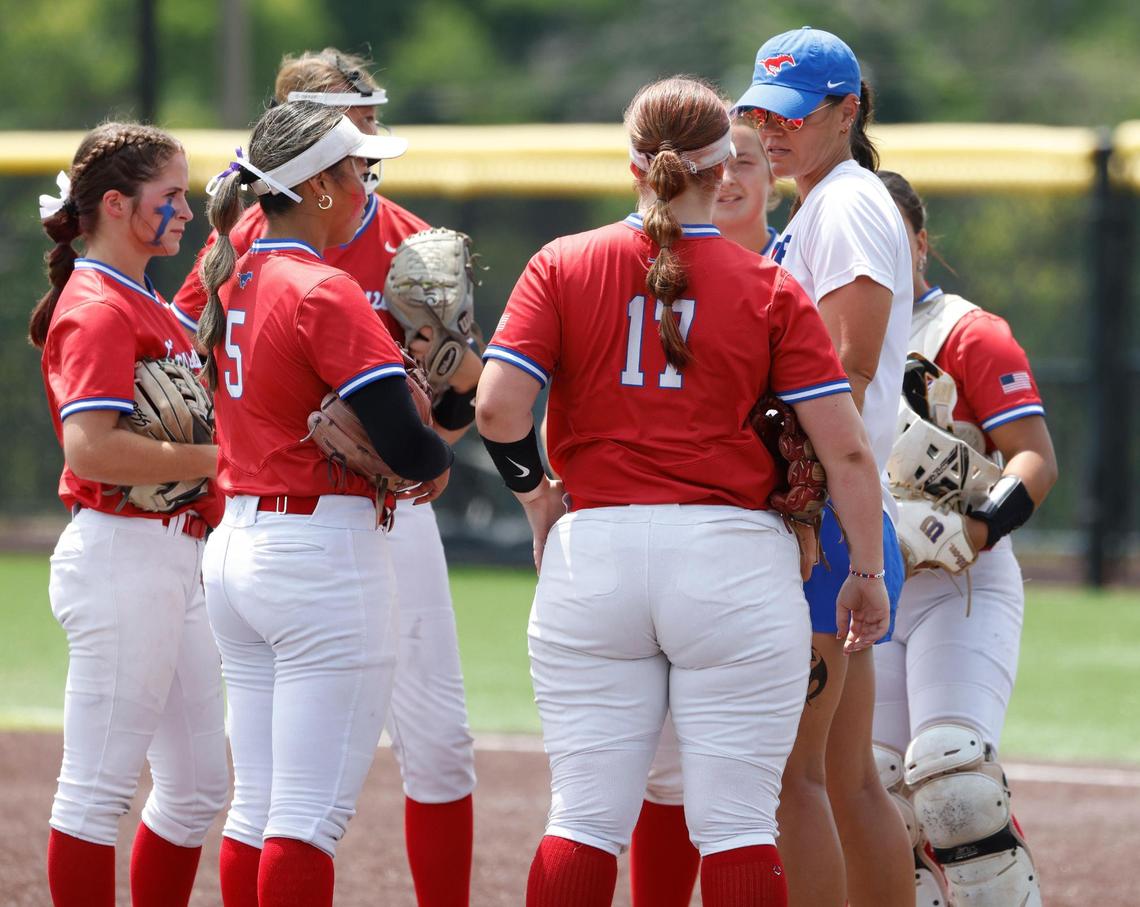 Grapevine head coach Christina Gwyn talks with the infield during the fourth inning of game 2 of the UIL softball semifinal 5A D2 playoffs at The Rabbit Hole in Forney, Texas, Saturday, May 24, 2025.