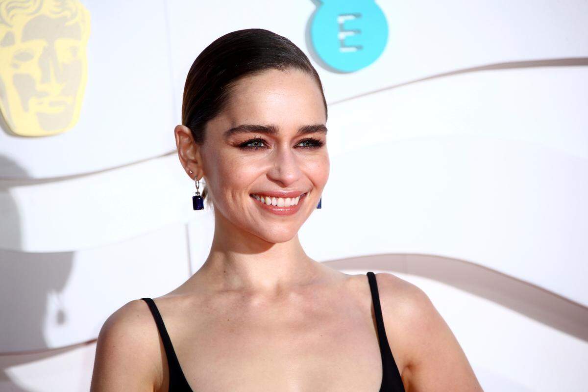 Actress Emilia Clarke poses for photographers upon arrival at the Bafta Film Awards, in central London, Sunday, Feb. 2 2020.
