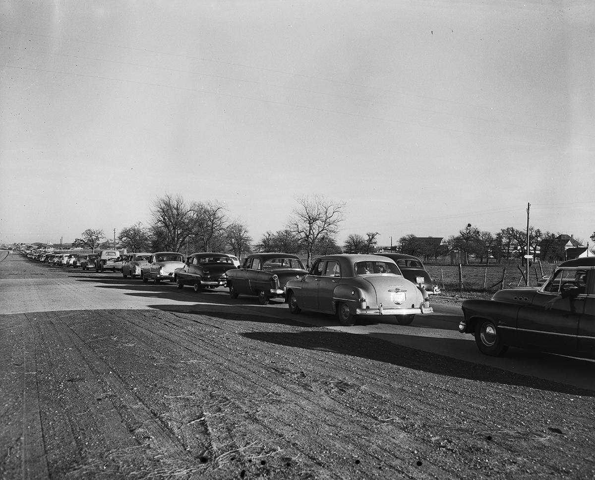 Jan. 24, 1953: Texas 183 on a Sunday afternoon between Hurst and Greater Fort Worth International Airport. A double line of automobiles, bumper-to-bumper, headed for the city’s “open house” preview of the new airport construction. About 75,000 people went through the grounds and terminal building during the day.