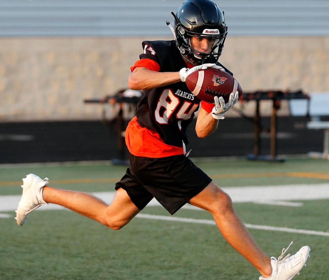A receiver completes a ball handling drill during football practice at Bearcat Stadium in Aledo, Monday Sept. 07, 2020. The morning high for the first helmet practice was 75. (Special to the Star-Telegram Bob Booth)