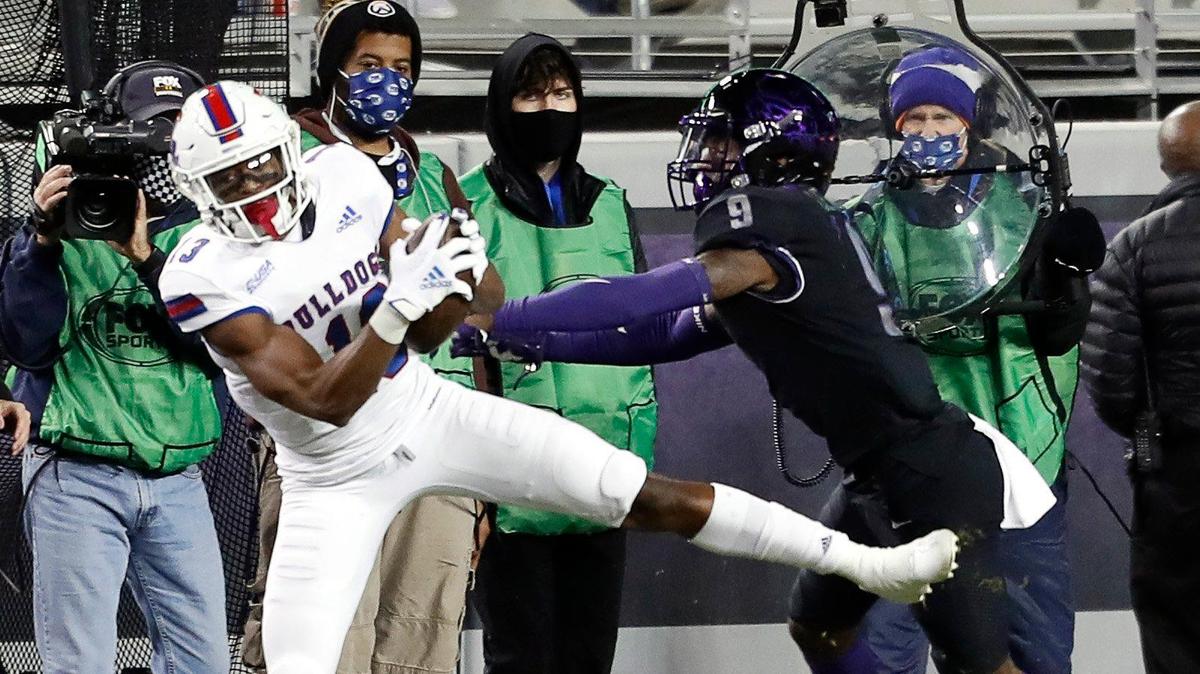 TCU corner C.J. Ceasar (9) pushes Louisiana Tech wide receiver Isaiah Graham (13) out of bounds during the first half of a NCAA football game at Amon G. Carter Stadium in Fort Worth, Texas, Saturday, Dec. 12, 2020. TCU led Louisiana Tech 31-0 at the half. (Special to the Star-Telegram Bob Booth)