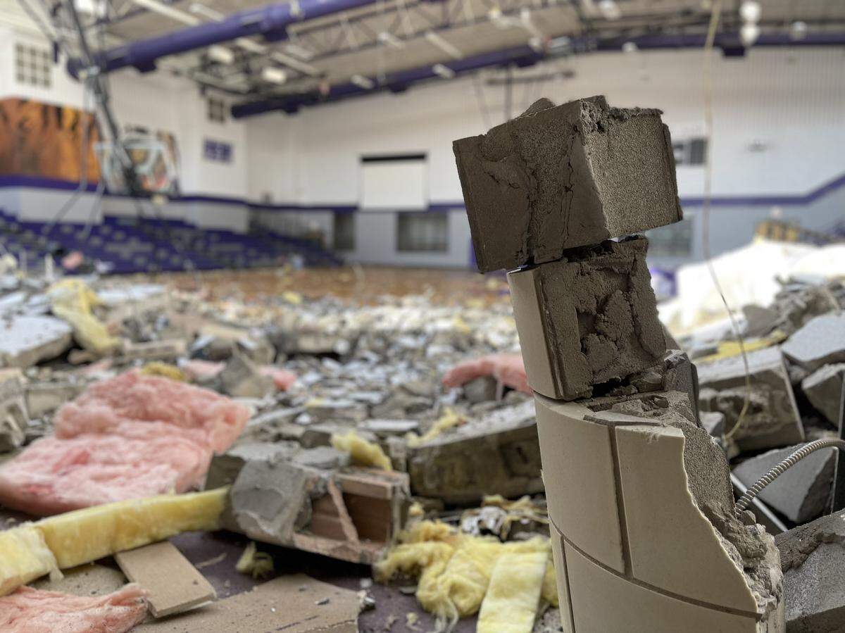 An apparent tornado tore the roof off the gym at Jacksboro High School in North Texas on Monday, March 21, 2022.