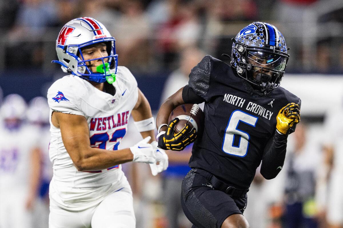 North Crowley wide receiver Quentin Gibson (6) runs past the Westlake defense to score a long touchdown on the first offensive play of the game in the first quarter of the UIL 6A Division I championship game at AT&T Stadium in Arlington on Saturday, Dec. 21, 2024.
