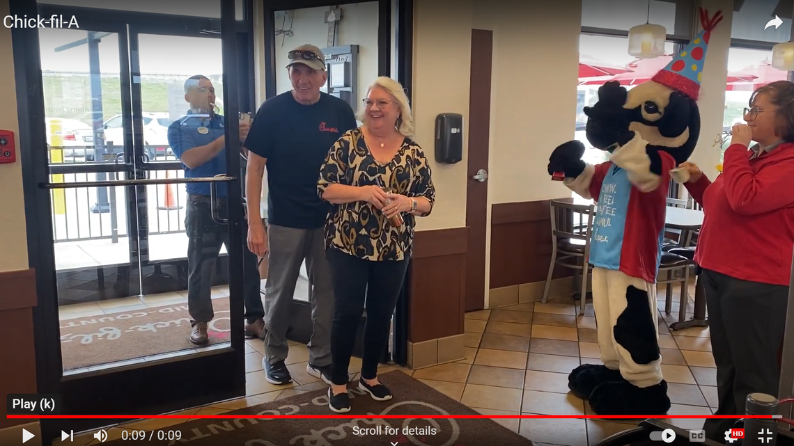 James Stinson celebrates eating at Chick-fil-A for 1,000 days in a row. His wife, Libby, joined him for breakfast.