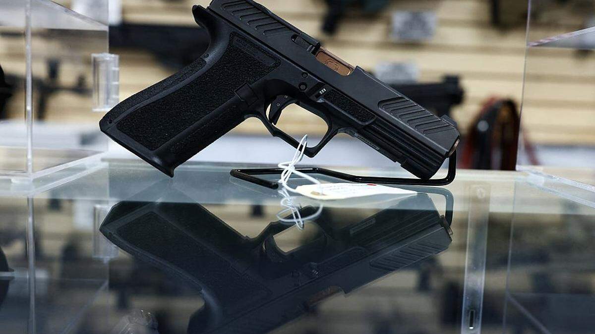 A shadow system pistol is displayed for sale in a gun store in Rio Rico, Santa Cruz County, Arizona, on Sept. 17, 2025.
