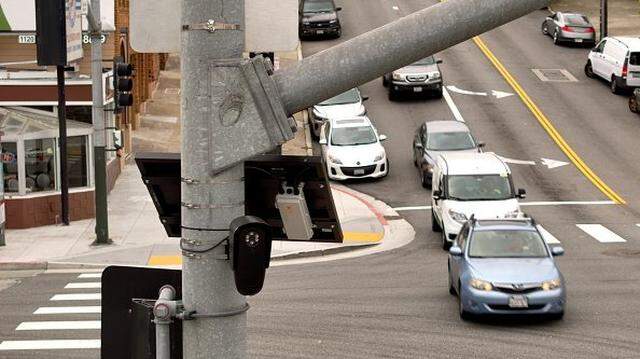 An automated license plate reader is seen mounted on a pole in San Francisco, California.