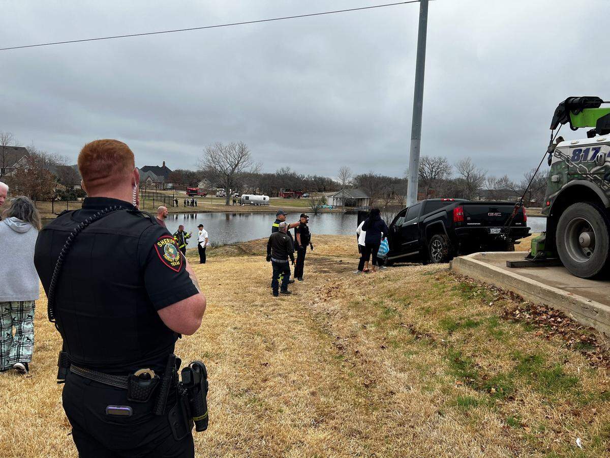 Tarrant County sheriff’s deputies helped rescue a woman from a pickup truck submerged in a pond in the 7300 block of Red Leaf Court on Tuesday morning, Feb. 7, 2023.