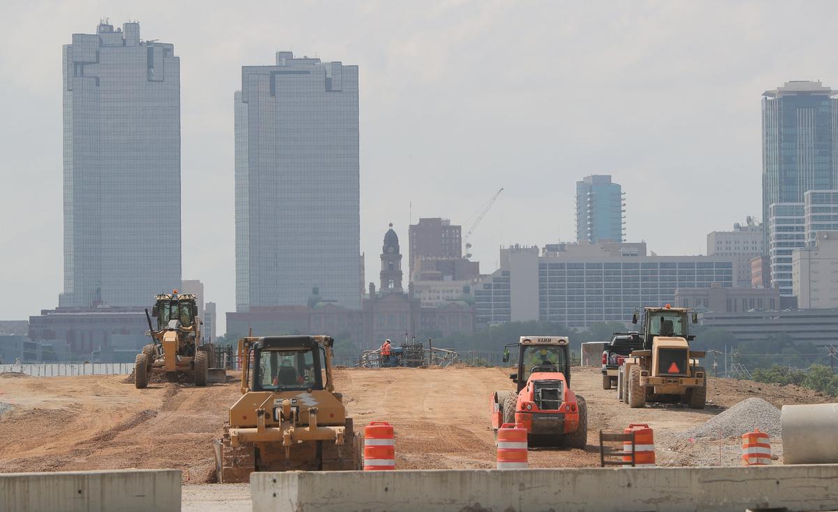 Construction of bridges along north Main Street that will go over rechanneled water of the Trinity River as part of the Trinity River Vision progresses, Friday, July 13, 2018.