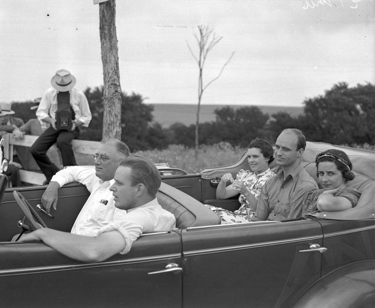 Elliott Roosevelt driving his father President Franklin Delano Roosevelt around the Dutch Branch Ranch during a 1937 visit.
