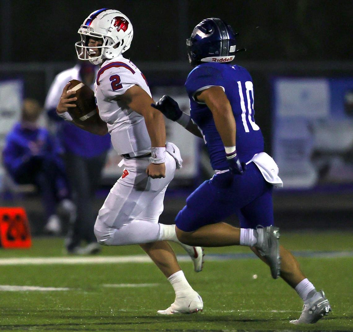 Parish Episcopal quarterback Preston Stone (2) tries to scramble past Nolan linebacker Eric Franco (10) during the first half of a high school football game, November 13, 2020 played at Doskocil Stadium in Fort Worth, Tx. (Steve Nurenberg Special to the Star-Telegram)