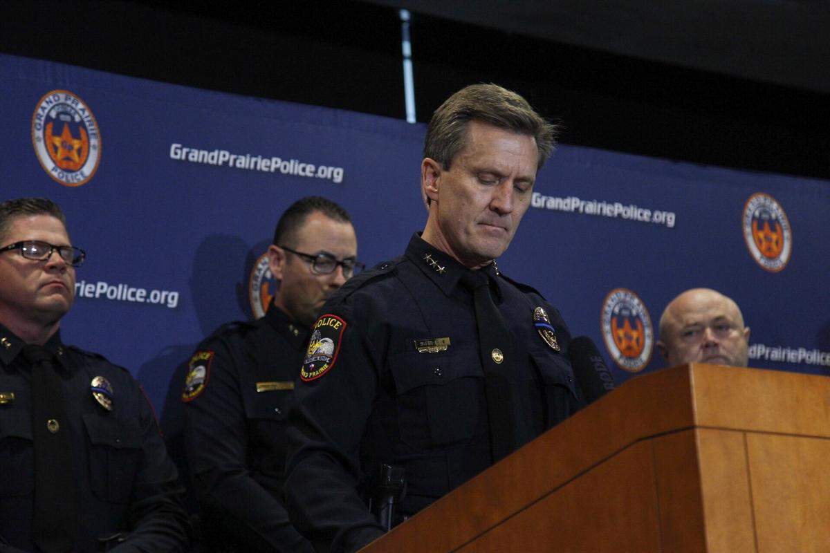 Grand Prairie Police Chief Steve Dye (center) at a press conference Friday, June 7, 2019, about the death of Officer Albert “A.J.” Castaneda, who was hit by a car while working traffic enforcement.