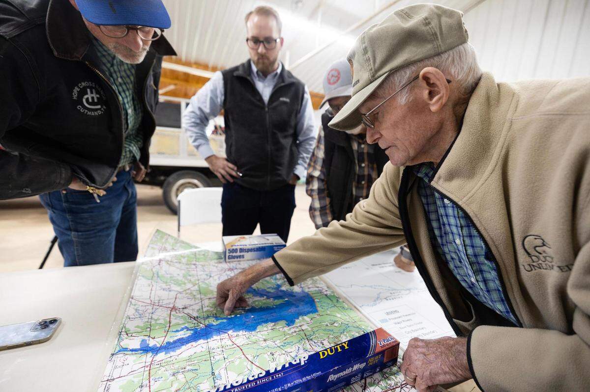 Residents of Cuthand, a small town about 170 miles northeast of Fort Worth, look over maps showing the potential imprint of Marvin Nichols Reservoir. State water planners argue the project is essential to keeping the Metroplex hydrated. Locals and environmentalists fear it would swallow thousands of acres of farmland and wildlife.