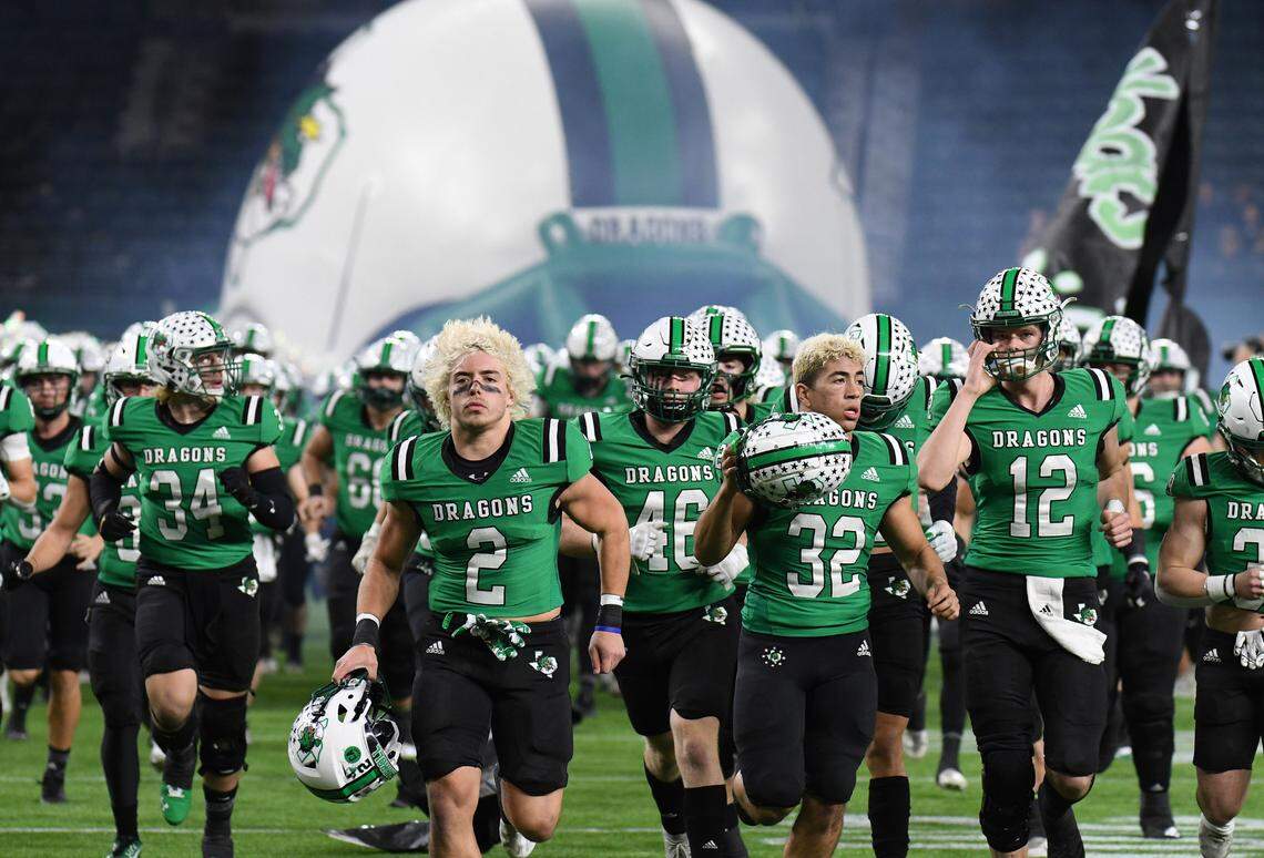 The Southlake Carroll football team takes the field before their Class 6A Division 1 Area football game against Midland Legacy Saturday, November 20, 2021 at Globe Life Field in Arlington, Texas. Special/Bob Haynes