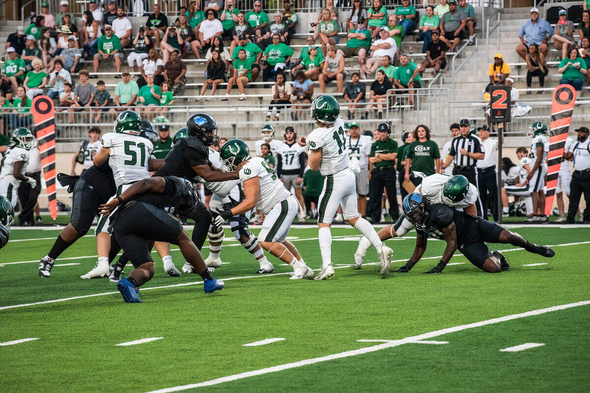 Arlignton quarterback Mason Hensley stands in the pocket and gets off a pass against North Crowley on Friday September 1, 2023 at Crowley IDS Stadium in Fort Worth, Texas.