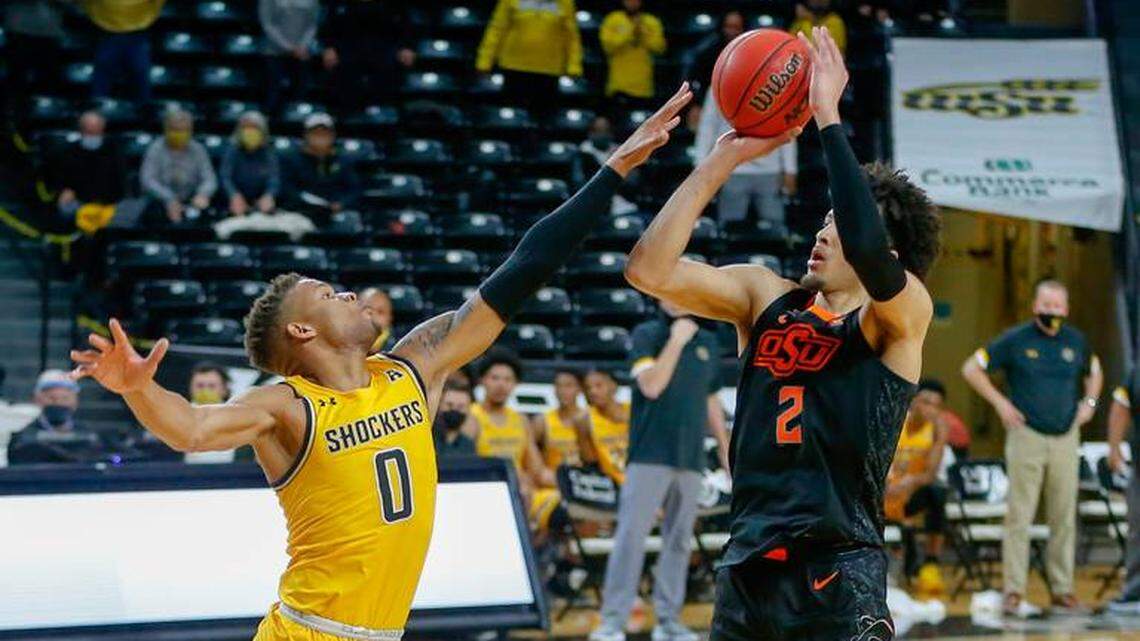 Oklahoma State’s Cade Cunningham (right) hit the game-winning shot against Wichita State on Saturday.