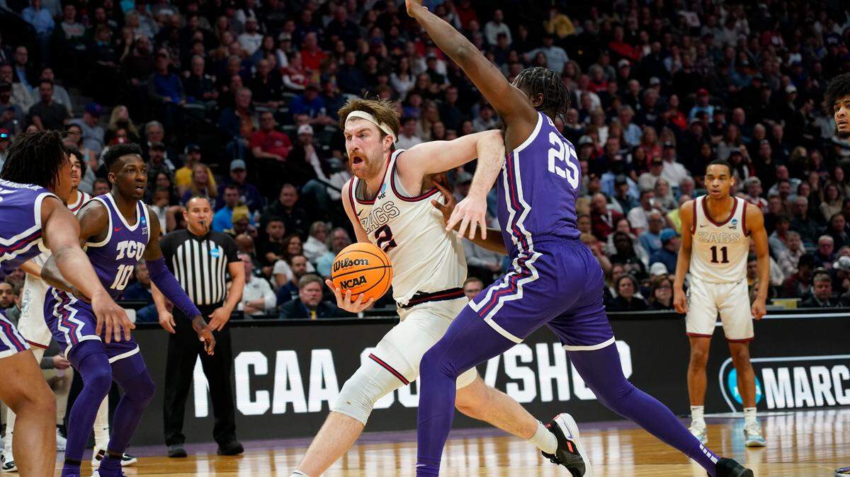 Gonzaga forward Drew Timme, left, drives past TCU center Souleymane Doumbia during Sunday’s second-round NCAA tournament game on Sunday in Denver.