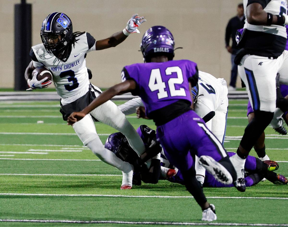 North Crowley wide receiver Dekoryian West-Davis (3) breaks out of the pack in the first half of a UIL high school football game at Crowley ISD Multi-Purpose Stadium in Fort Worth, Texas, Thursday, Nov. 02, 2023. North Crowley led Crowley 35-14 at the half.