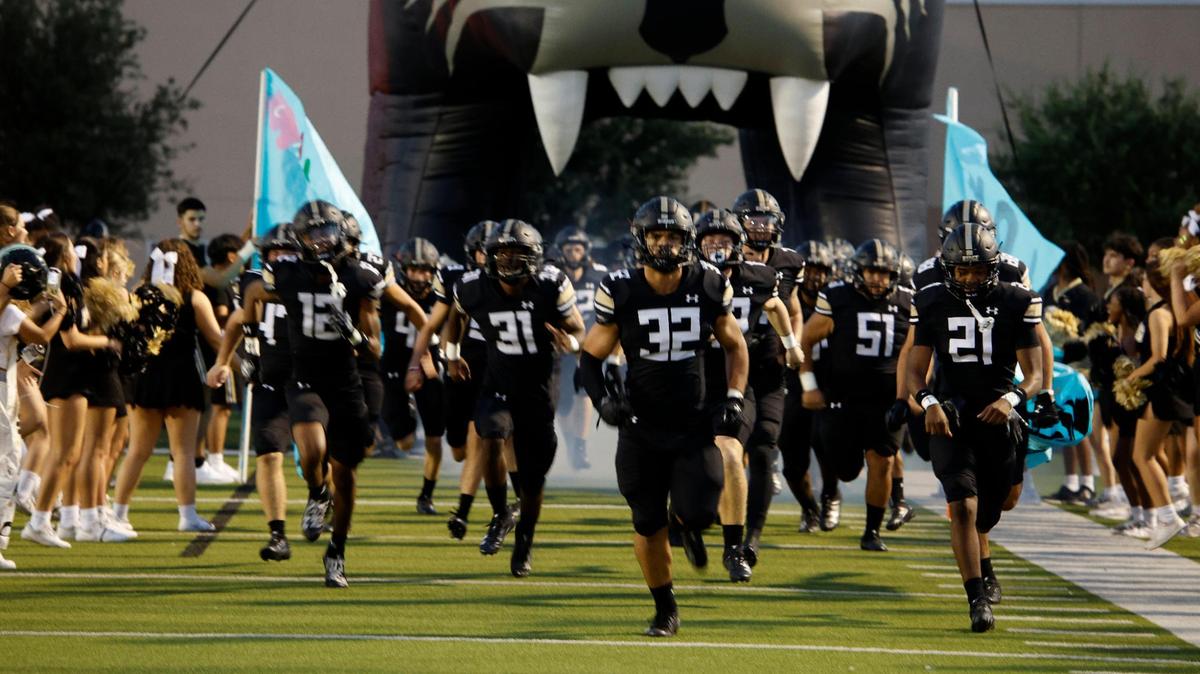 Keller Fossil Ridge Panthers enter the field for the first half of a UIL high school football game at Keller ISD Stadium in Keller, Texas, Thursday, Sept. 21, 2023.
